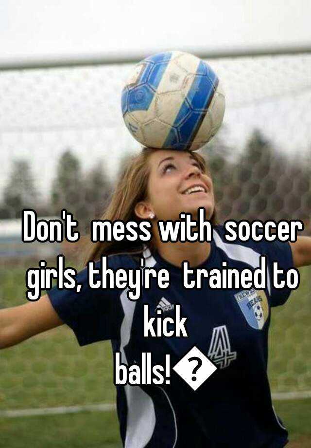 Girls kick balls