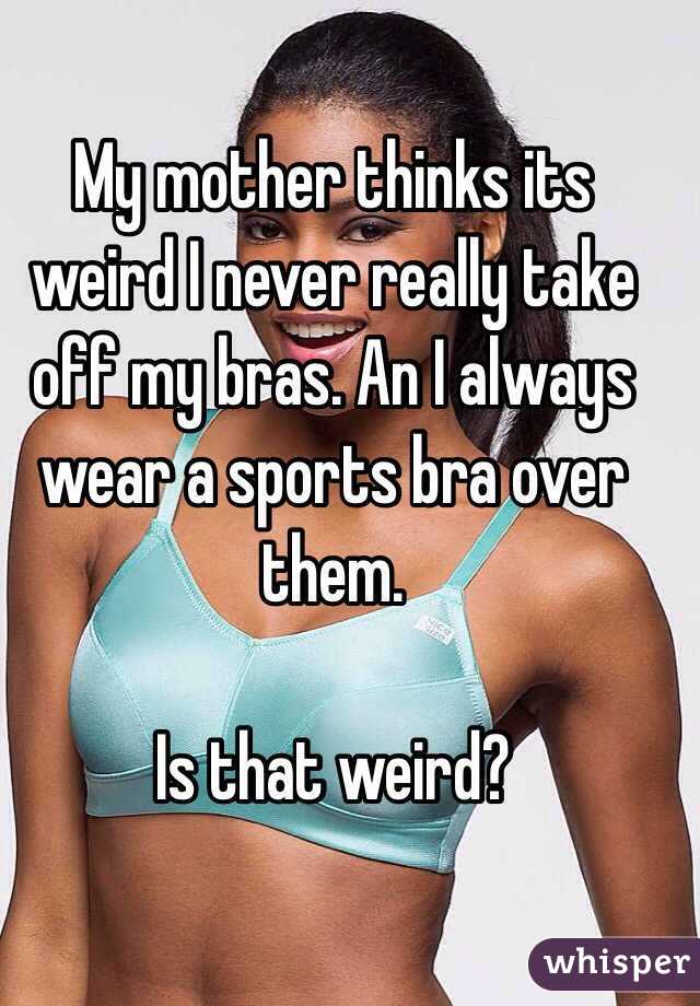 taking off a sports bra