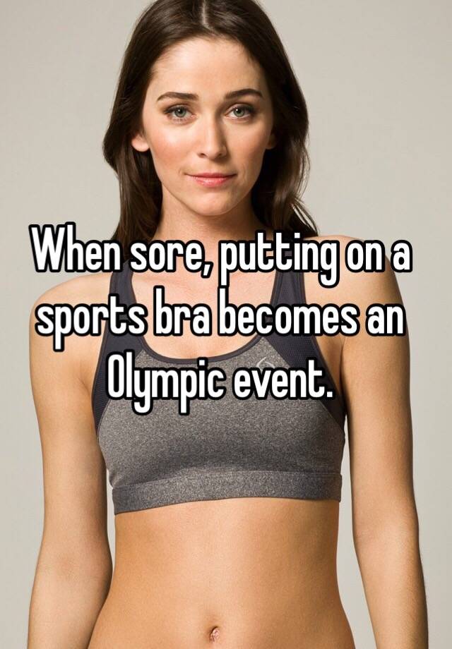 putting on a sports bra