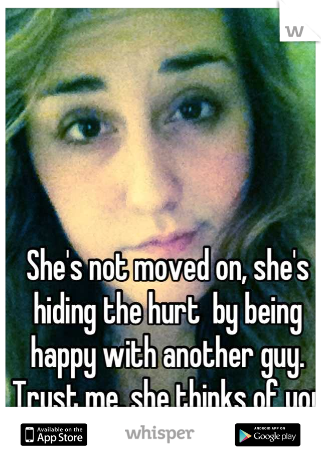 She's not moved on, she's hiding the hurt  by being happy with another guy. Trust me, she thinks of you every night. 