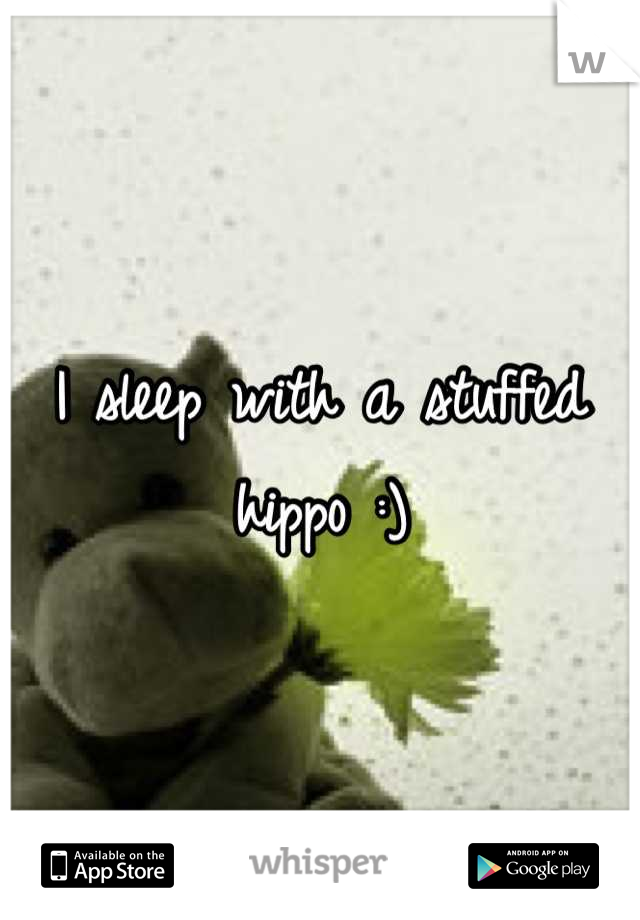 I sleep with a stuffed hippo :)