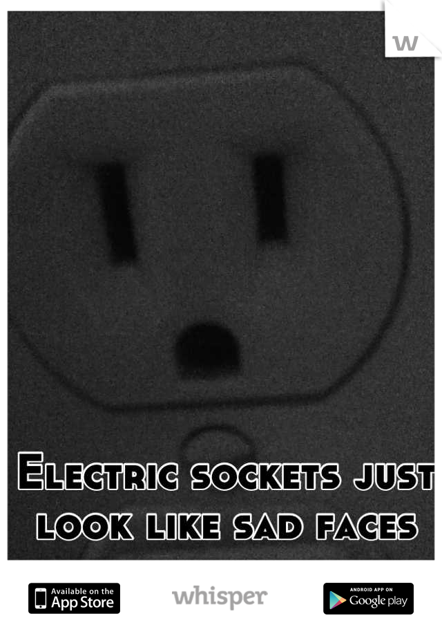 Electric sockets just look like sad faces to me.
