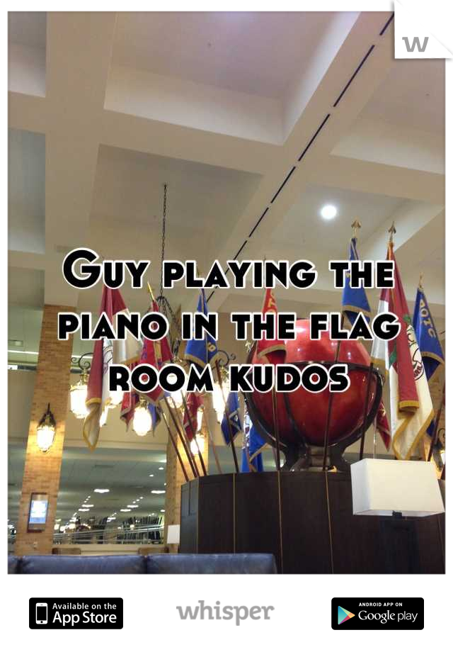 Guy playing the piano in the flag room kudos