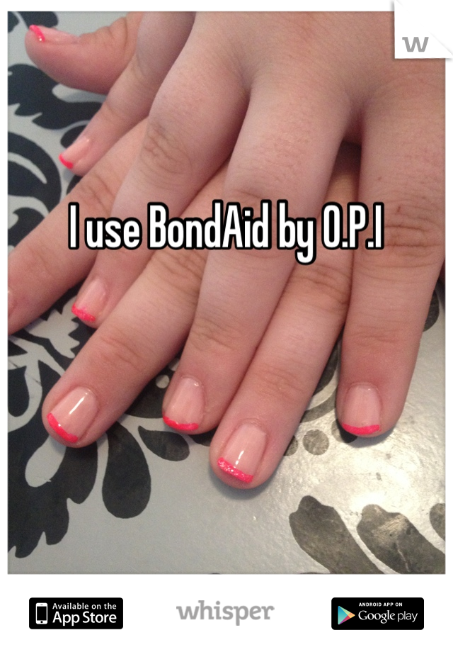 I use BondAid by O.P.I
