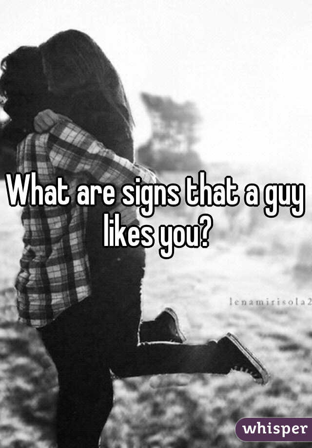 What are signs that a guy likes you?