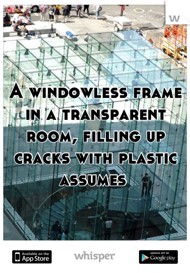 A windowless frame in a transparent room, filling up cracks with plastic assumes 