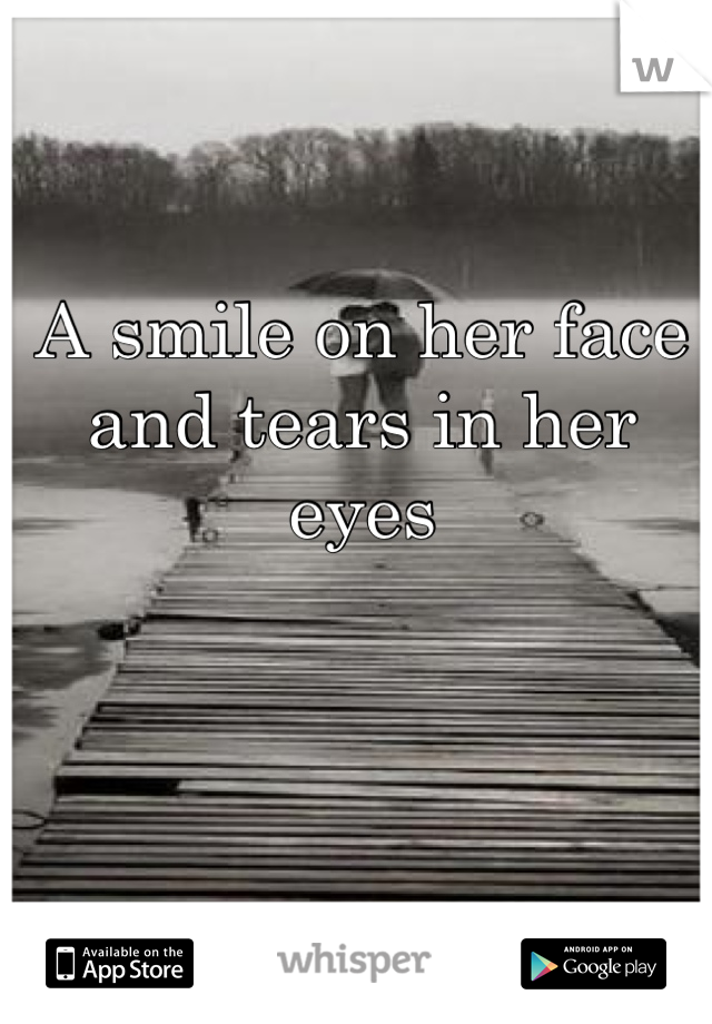 A smile on her face and tears in her eyes