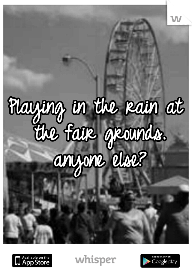 Playing in the rain at the fair grounds. anyone else?