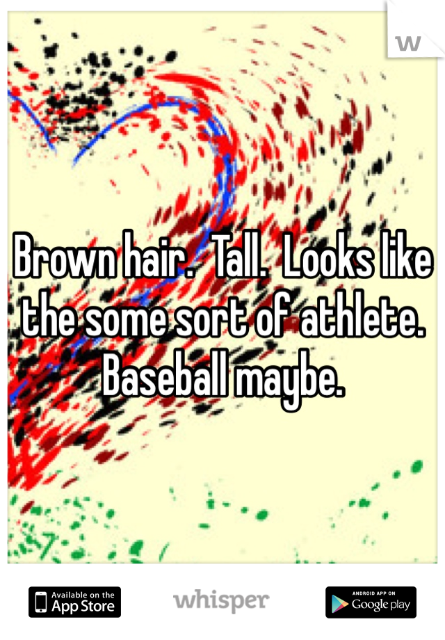 Brown hair.  Tall.  Looks like the some sort of athlete.  Baseball maybe.  