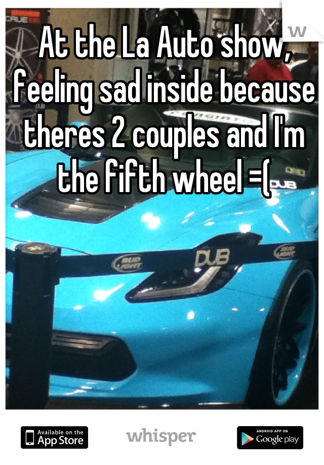 At the La Auto show, feeling sad inside because theres 2 couples and I'm the fifth wheel =(