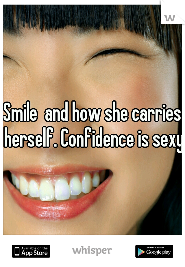 Smile  and how she carries herself. Confidence is sexy