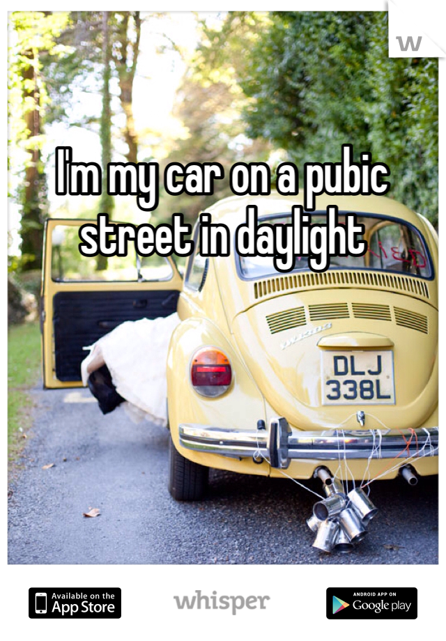 I'm my car on a pubic street in daylight