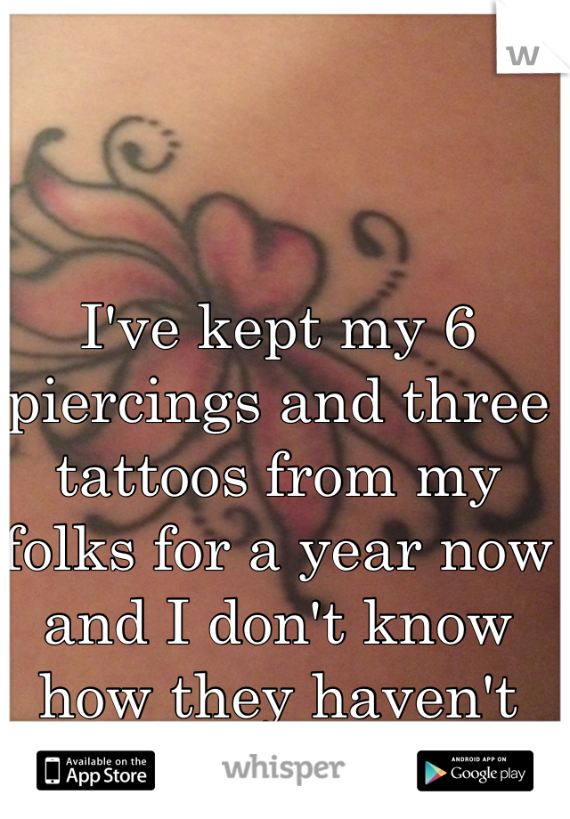 I've kept my 6 piercings and three tattoos from my folks for a year now and I don't know how they haven't noticed 