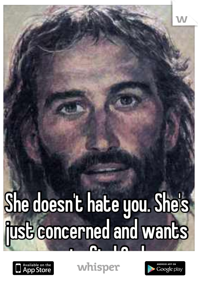 She doesn't hate you. She's just concerned and wants you to find God. 