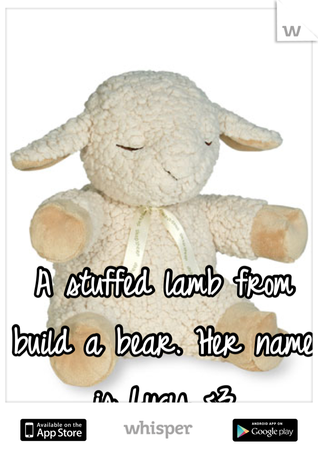 A stuffed lamb from build a bear. Her name is Lucy <3