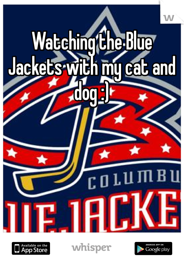 Watching the Blue Jackets with my cat and dog :)