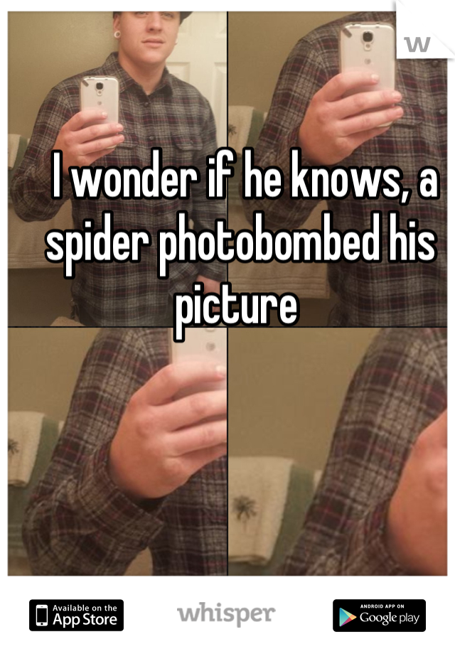  I wonder if he knows, a spider photobombed his picture 