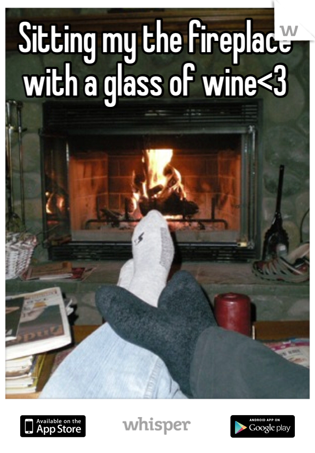 Sitting my the fireplace with a glass of wine<3 