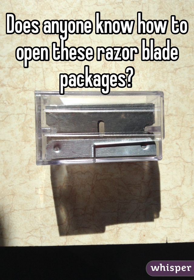 Does anyone know how to open these razor blade packages?
