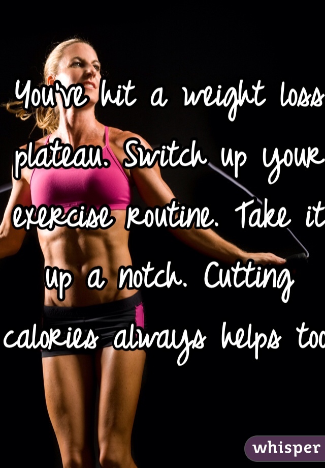 You've hit a weight loss plateau. Switch up your exercise routine. Take it up a notch. Cutting calories always helps too.