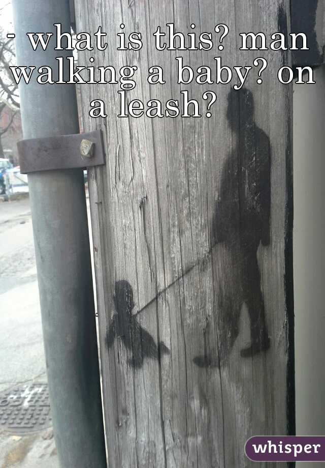 - what is this? man walking a baby? on a leash?  