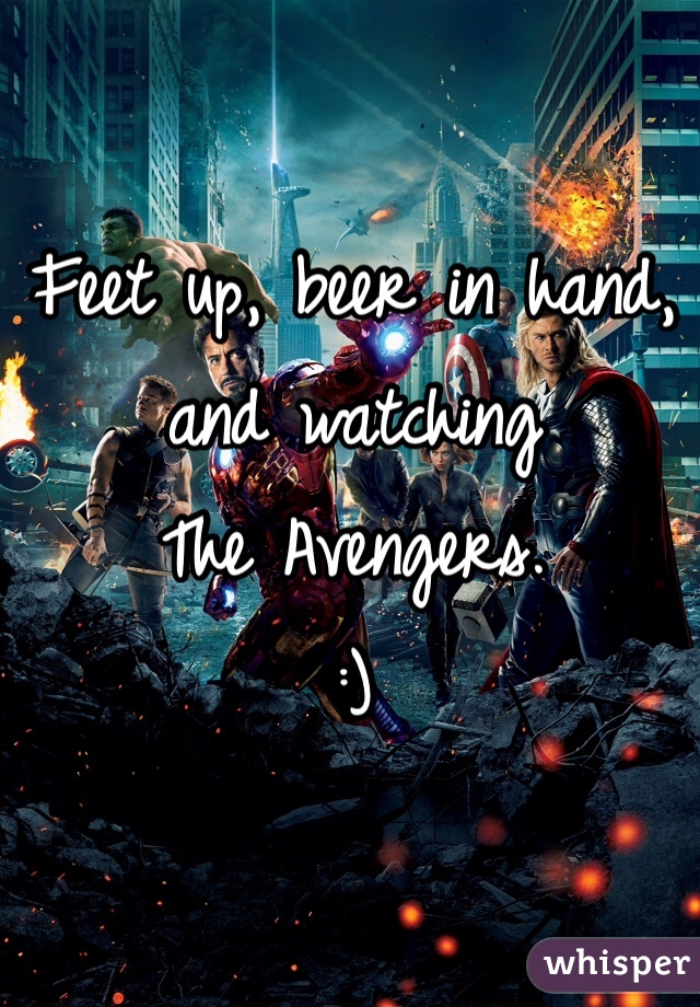Feet up, beer in hand,
and watching
The Avengers.
:)