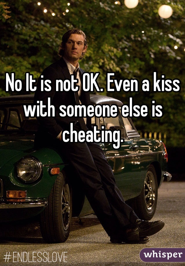 No It is not OK. Even a kiss with someone else is cheating.
