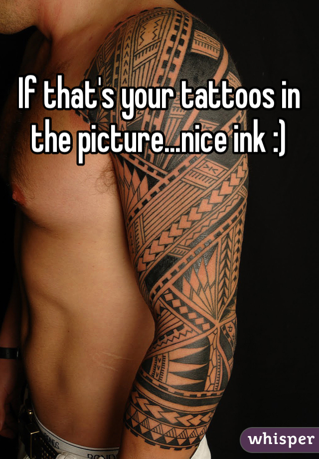 If that's your tattoos in the picture...nice ink :)