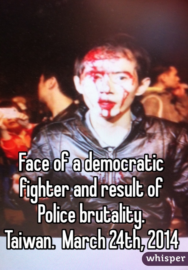 Face of a democratic fighter and result of Police brutality. 
Taiwan.  March 24th, 2014