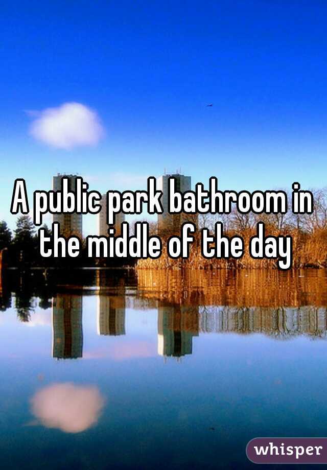 A public park bathroom in the middle of the day