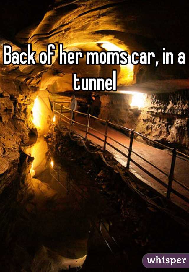 Back of her moms car, in a tunnel