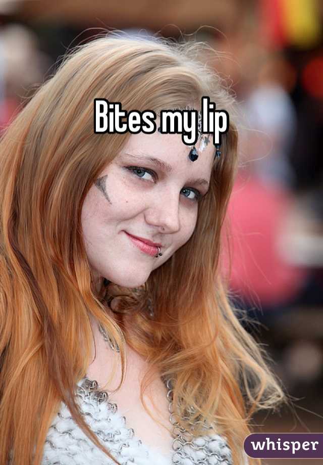 Bites my lip