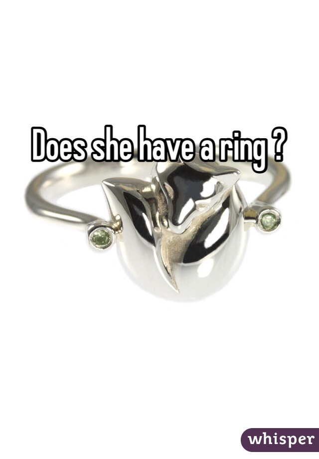 Does she have a ring ? 
