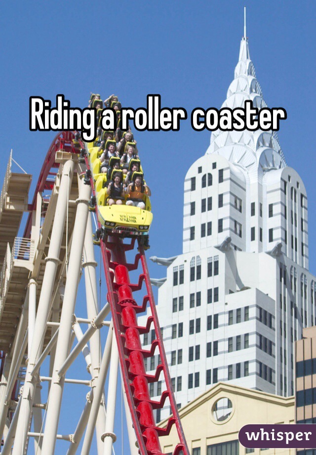 Riding a roller coaster