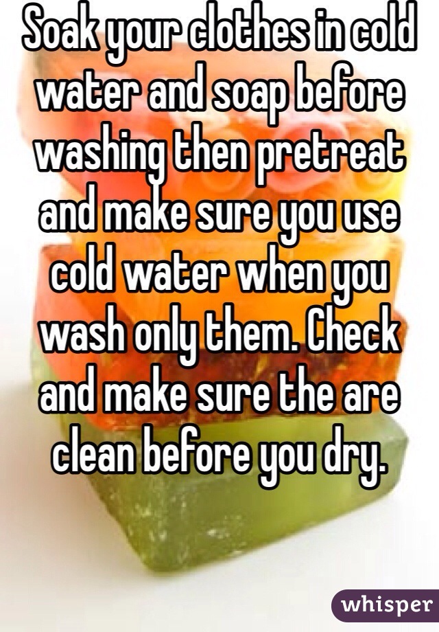 Soak your clothes in cold water and soap before washing then pretreat and make sure you use cold water when you wash only them. Check and make sure the are clean before you dry. 