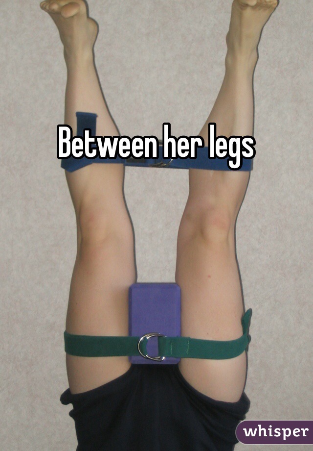 Between her legs