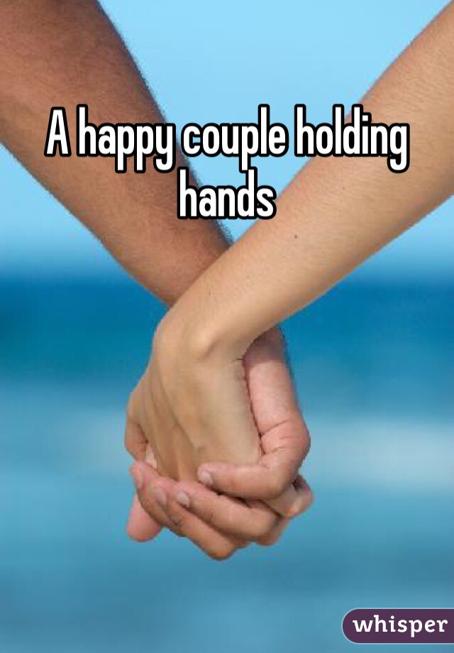 A happy couple holding hands 