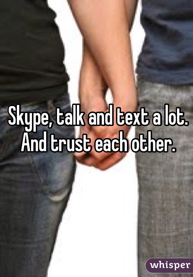 Skype, talk and text a lot. And trust each other. 