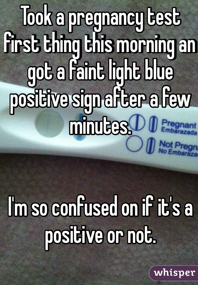 Took a pregnancy test first thing this morning an got a faint light blue positive sign after a few minutes.


I'm so confused on if it's a positive or not. 