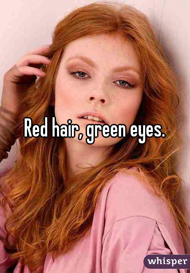 Red hair, green eyes.