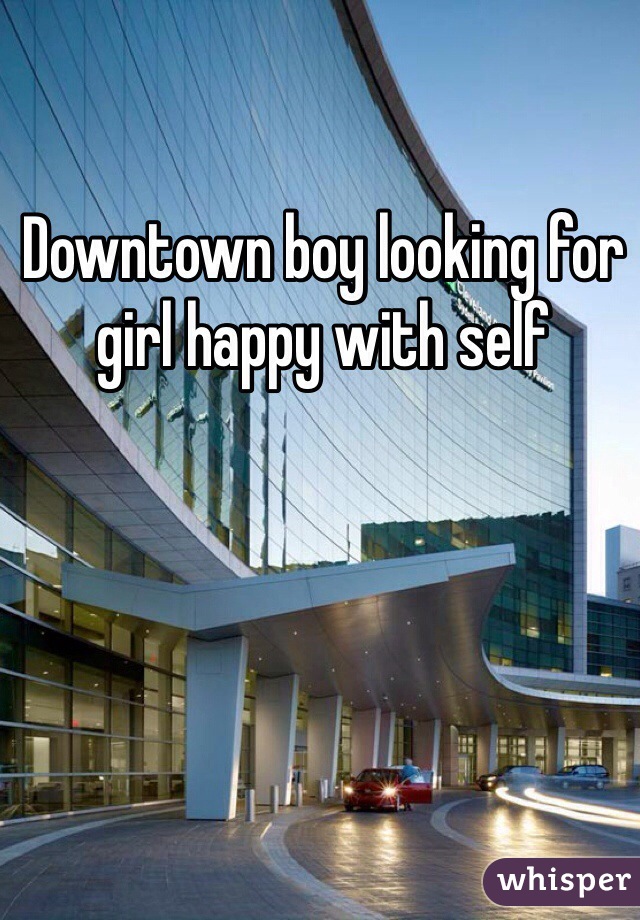 Downtown boy looking for girl happy with self