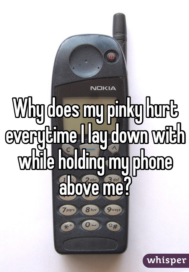 Why does my pinky hurt everytime I lay down with while holding my phone above me?