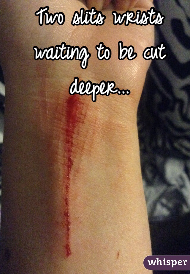 Two slits wrists waiting to be cut deeper...