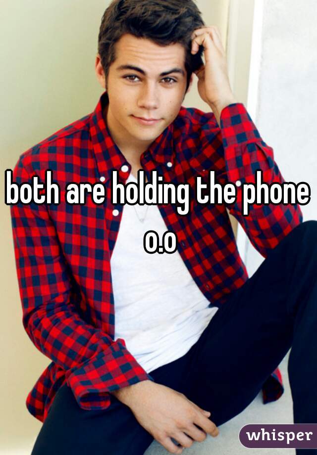 both are holding the phone o.o