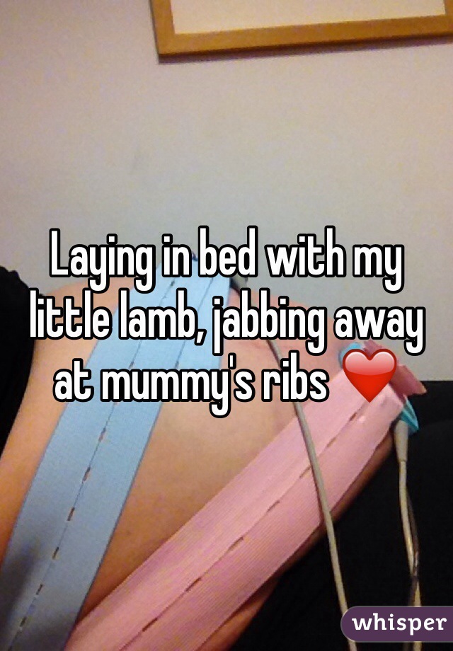 Laying in bed with my little lamb, jabbing away at mummy's ribs ❤️