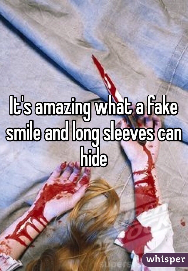 It's amazing what a fake smile and long sleeves can hide
