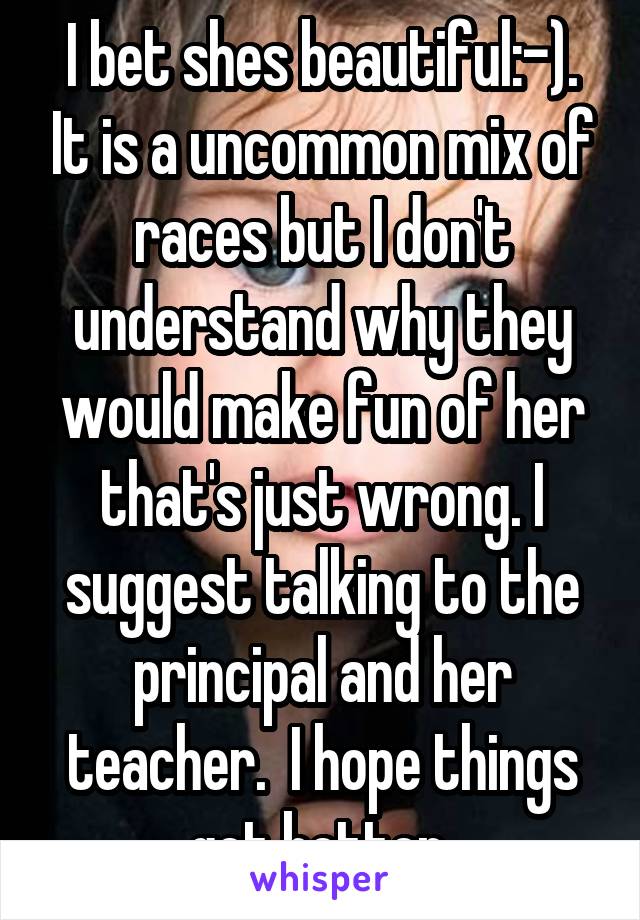 I bet shes beautiful:-). It is a uncommon mix of races but I don't understand why they would make fun of her that's just wrong. I suggest talking to the principal and her teacher.  I hope things get better 