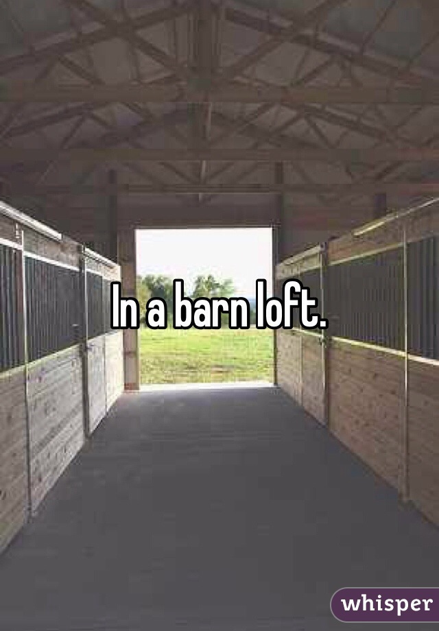 In a barn loft.