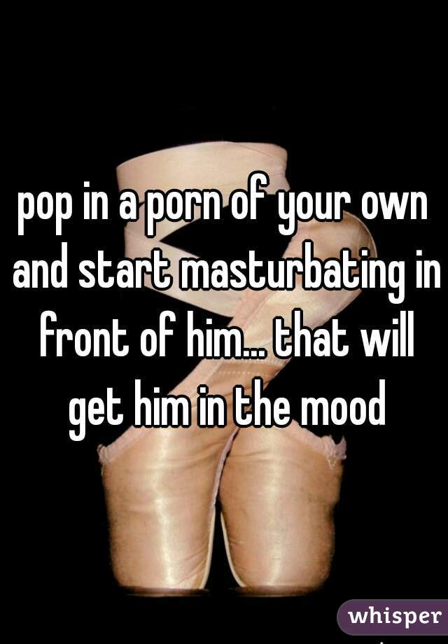 pop in a porn of your own and start masturbating in front of him... that will get him in the mood