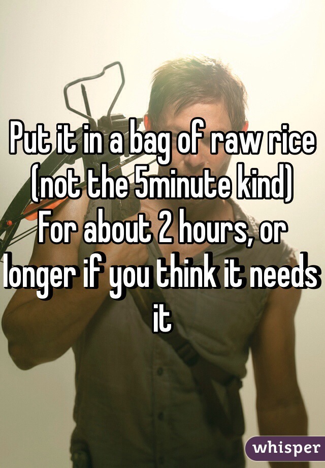 Put it in a bag of raw rice (not the 5minute kind) 
For about 2 hours, or longer if you think it needs it 